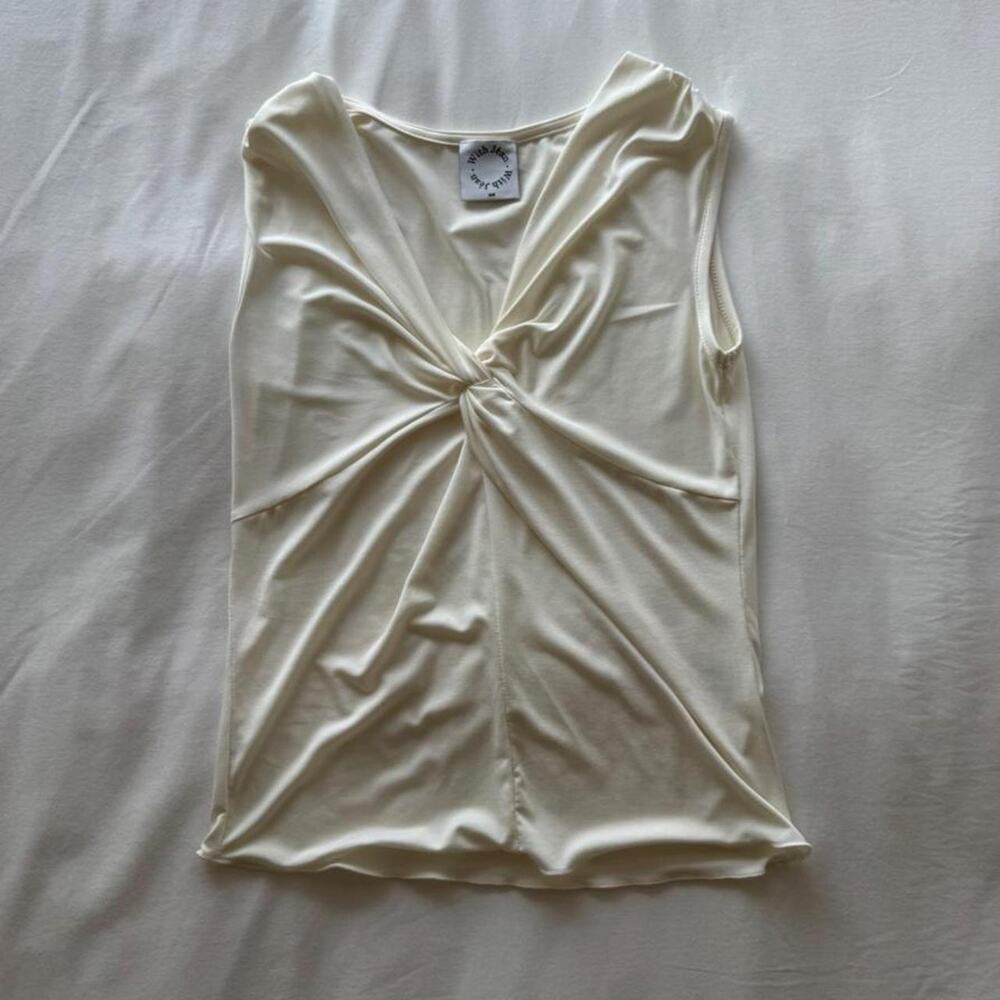 With jean cream twist front top